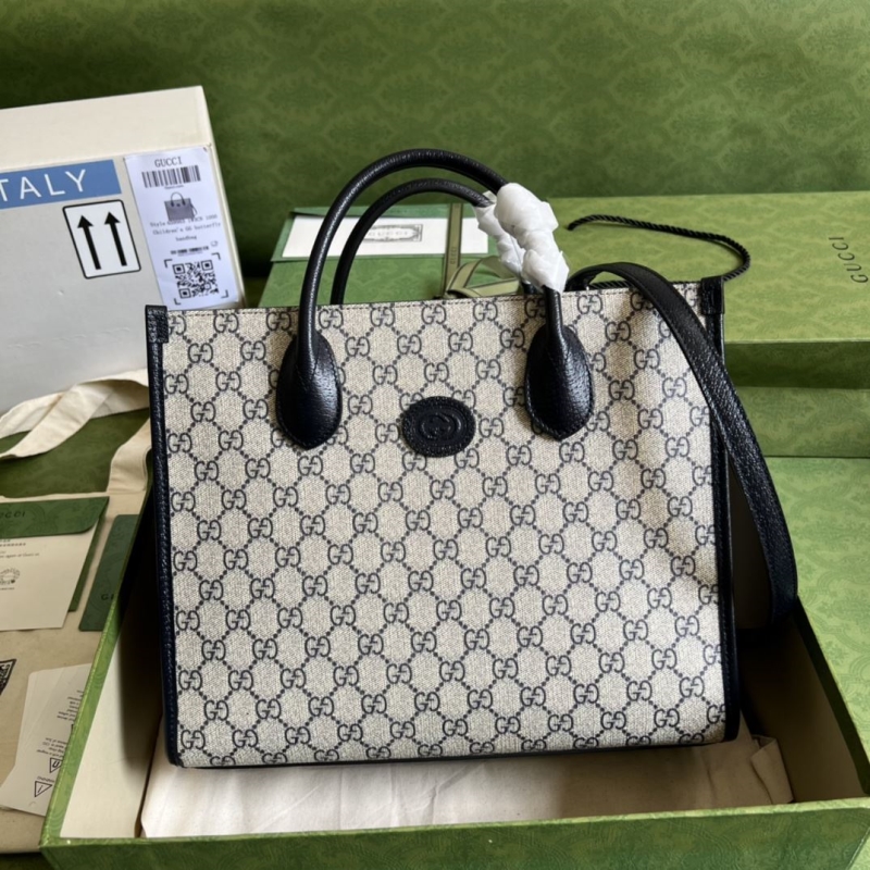 G*u*i shopping bags